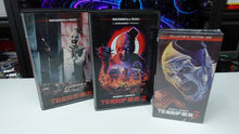 Load image into Gallery viewer, Terrifier 1, 2 &amp; 3 VHS Tapes NEW Official Releases Broke Horror Fan 2 Clamshell 1 Slip Case
